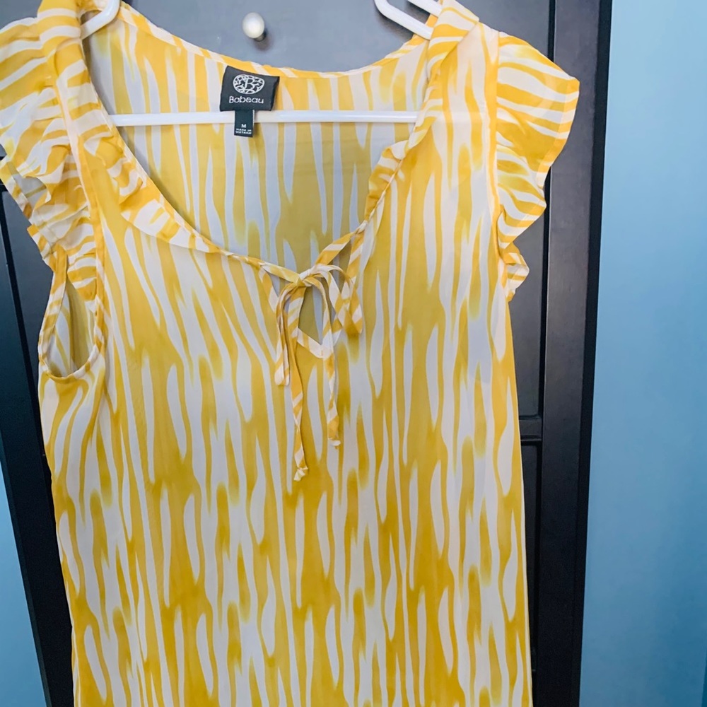 Flutter sleeve tank